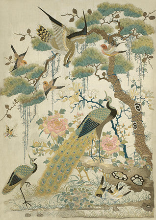 Peacocks and birds around a Magnolia Tree